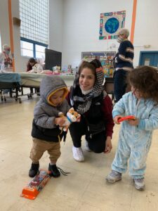 A family enjoys the Holiday Market, a family engagement event the CRC puts on annually